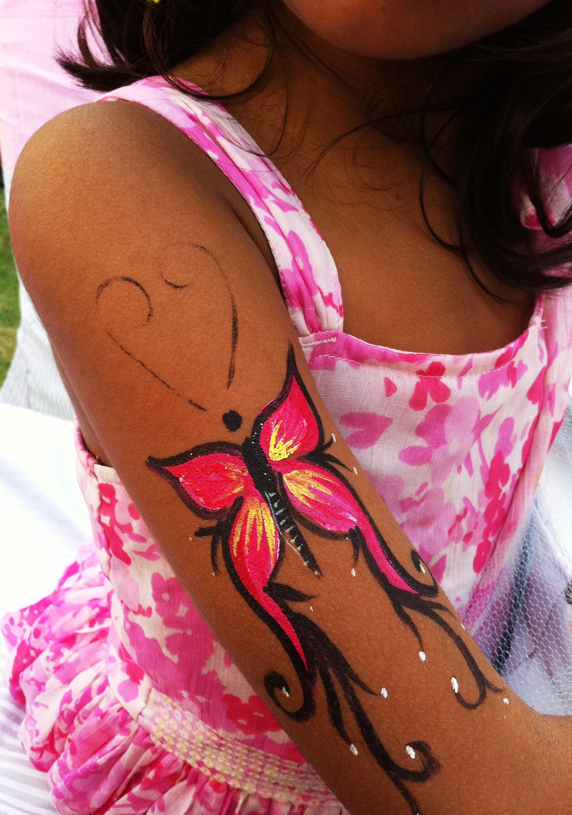and a butterfly tattoo