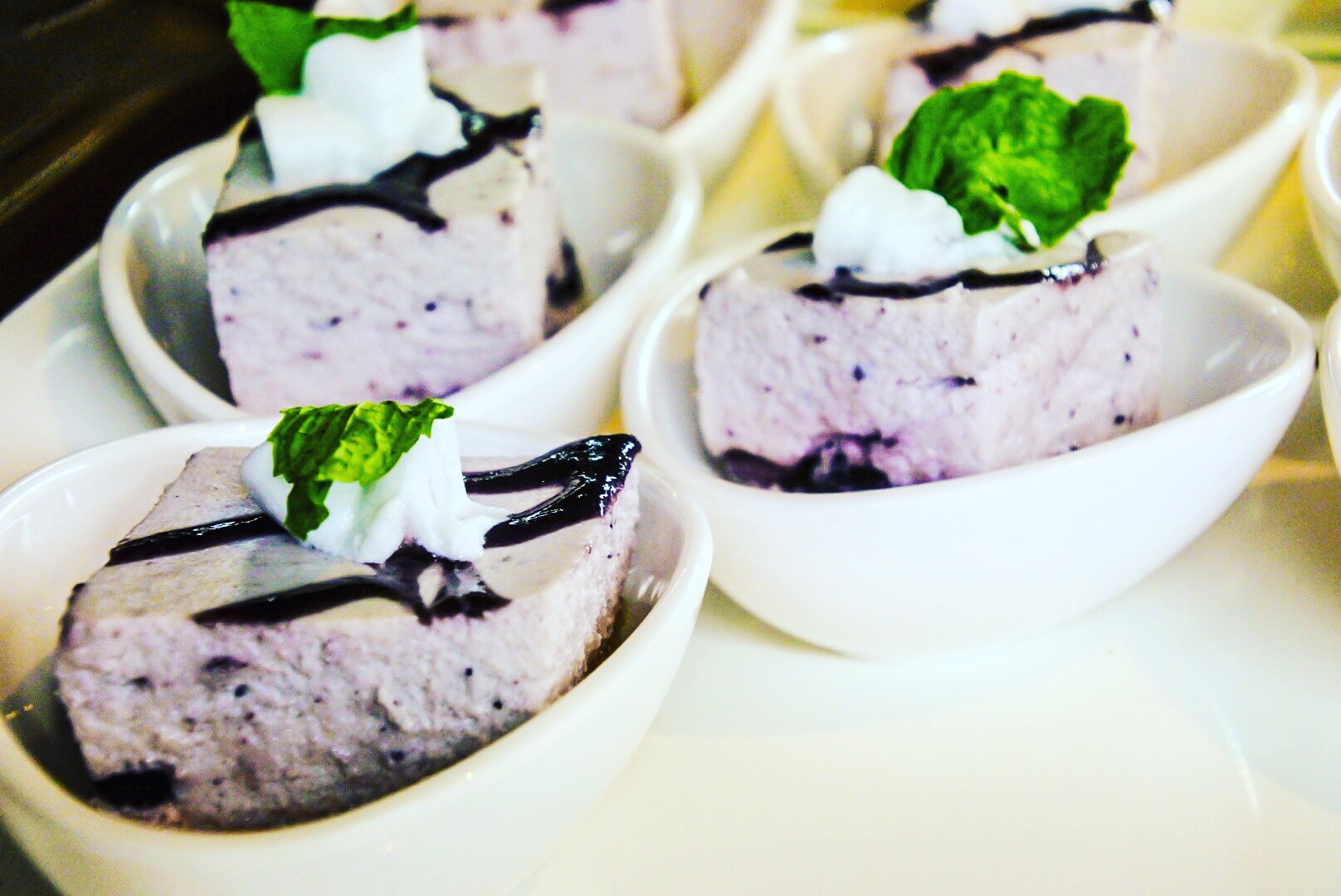 Blueberry cheesecakes on display