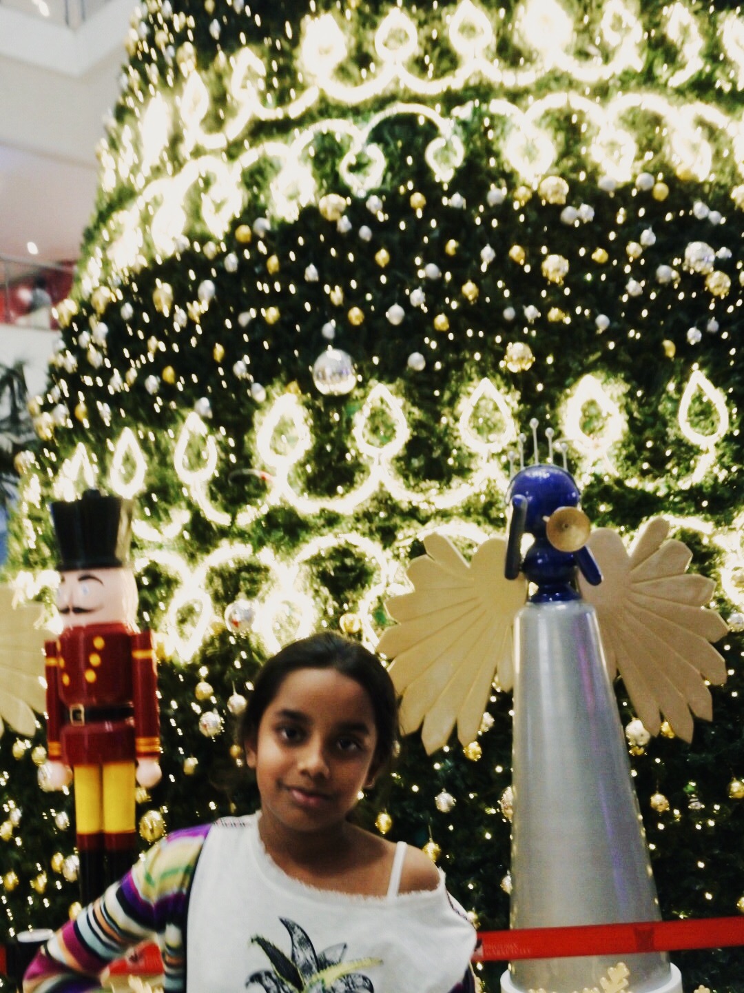 In front of the glorious Christmas tree