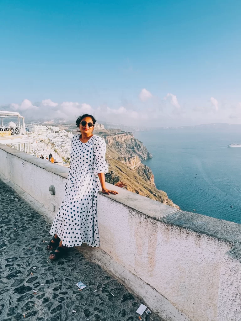 Posing against the sunset in Fira